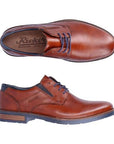Brown leather laced derby dress shoes with detail stitching and Rieker logo'd footbed and a brown heel accent on the rubber outsole.