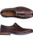 Brown leather slip-on dress shoe with toe cap and navy accents and navy outsole. Rieker logo on brown insole.