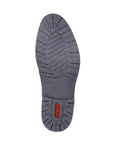 Navy outsole of men's dress shoe with red Rieker logo on center of heel.