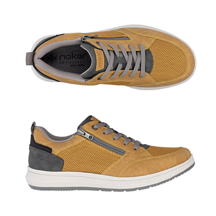 Pair of yellow mesh and faux  leather sneakers with laces, side zipper, grey heel accent, grey Rieker logo'd footbed, white midsole and grey outsole.