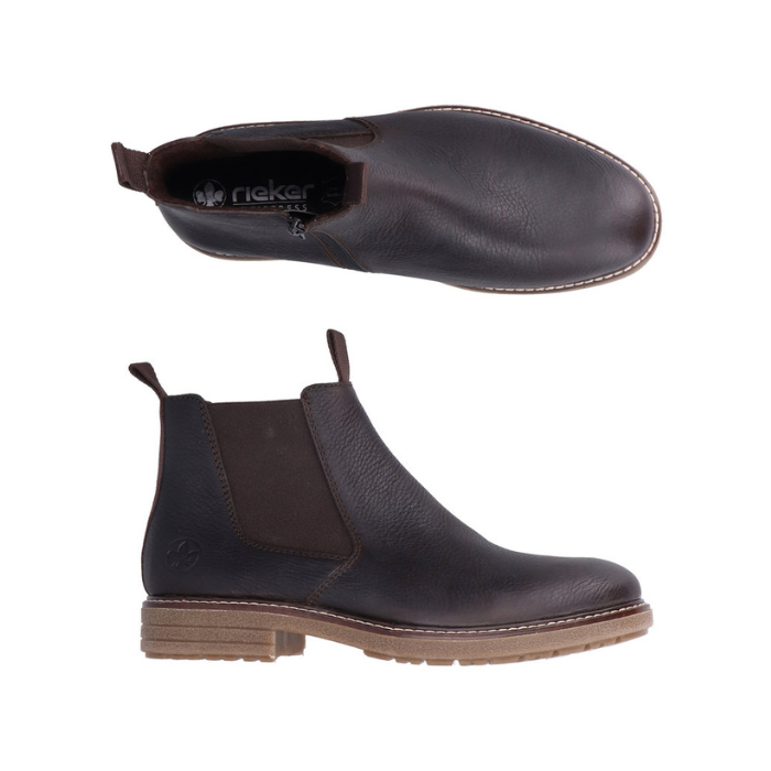 Pair of Black leather chelsea boots with elastic side panels, pull tabs, side zipper, black Rieker logo'd footbed and tan outsole.