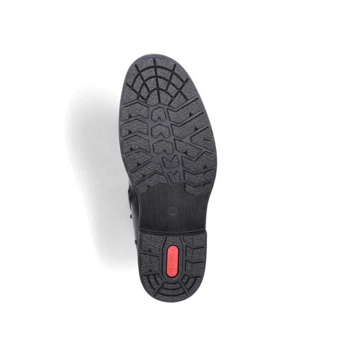 Black treaded outsole with red Rieker logo stamped on heel.