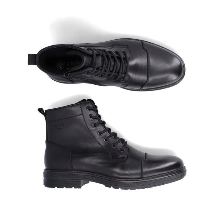 Pair of Black leather ankle bootswith laces, inside zipper, cap toe and treaded outsole.