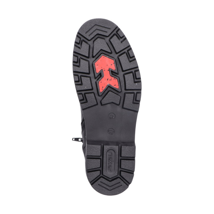 Black treaded rubber outsole with arrow shaped red grip at ball of foot and "Rieker" stamped in heel.