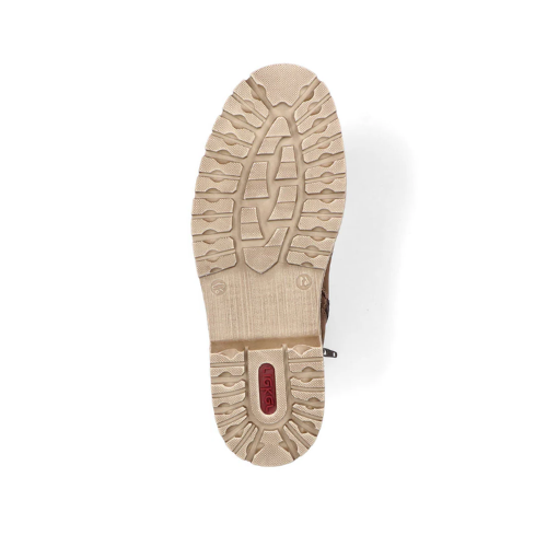 Beige light treaded outsole of boot with red Rieker logo on heel.
