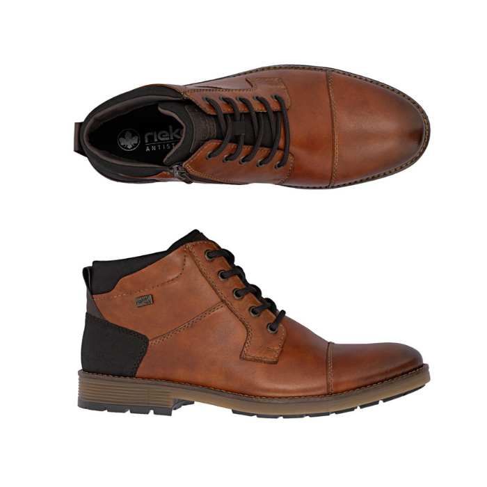 Pair of Brown leather dress boots with dark brown accents and brown lances with detailed stitching. 