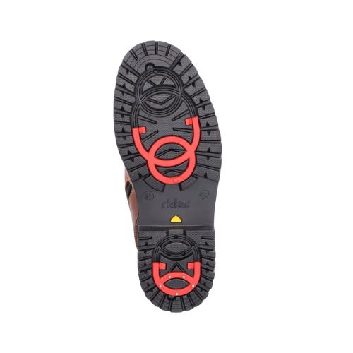 Black treaded outsole with red flip grips at ball and heel with Rieker logo stamped in middle.