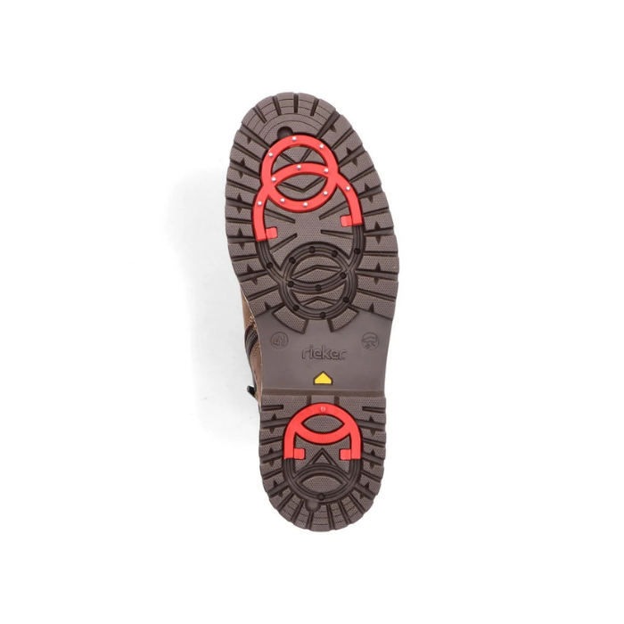 Dark Brown lugged outsole with red OC collapsible ice grips at ball and heel of outsole.