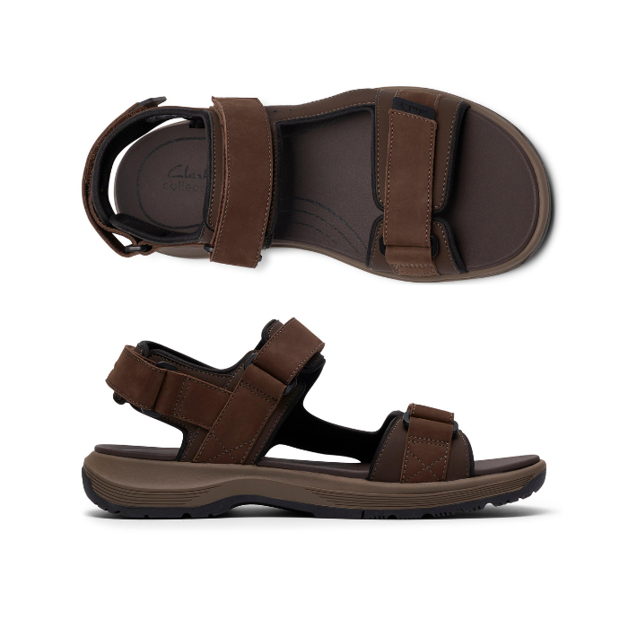 Pair of walking backstrap sandals with Brown nubuck Velcro straps, Clarks logo'd brown footbed and light brown outsole. 
