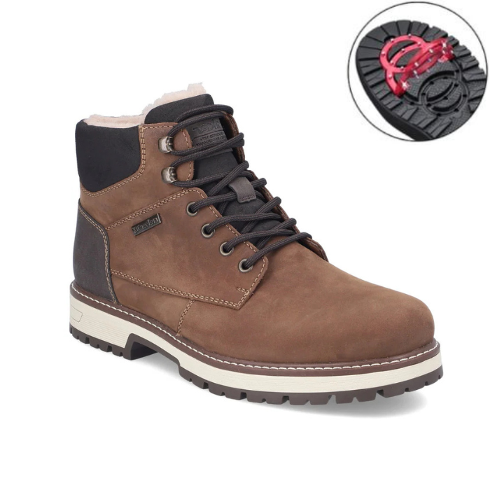 A brown suede lace-up ankle boot with black trim, a black heel, and a white midsole, with a circular inset highlighting the red collapsible ice pics on the outsole.