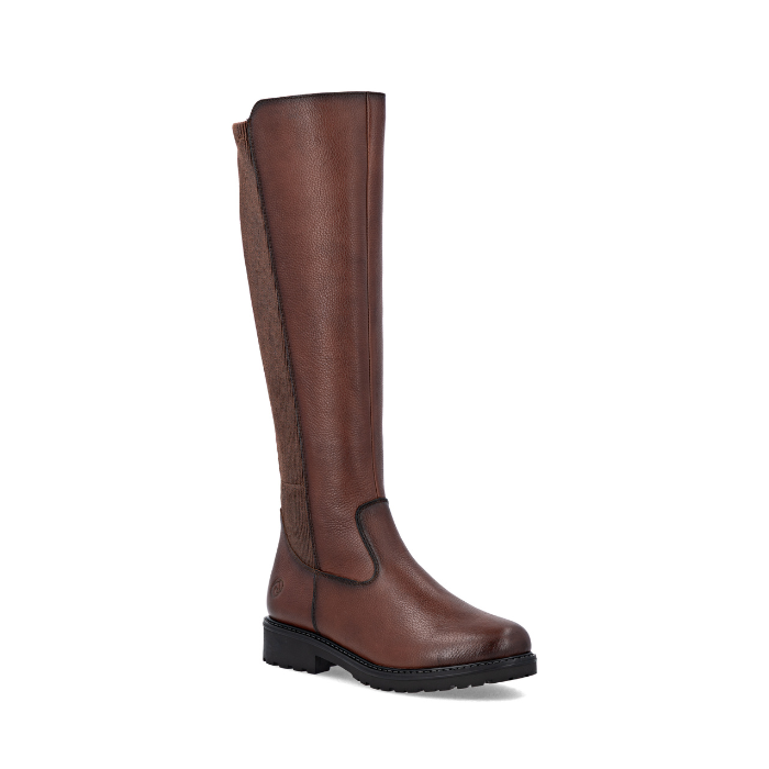 A brown leather knee-high riding-style boot with stretch fabric over back of calf,  burnished accents and a deep treaded black outsole.