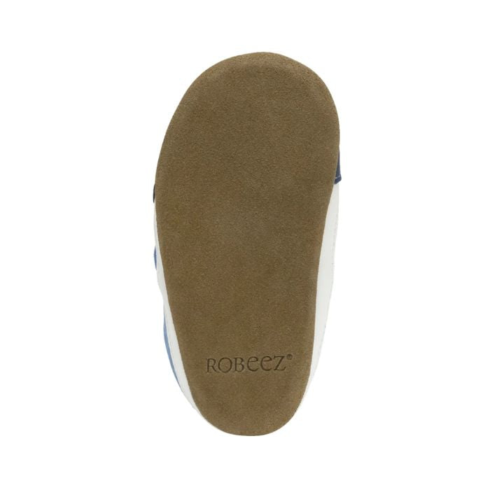 Beige suede outsole with "Robeez" logo on heel.
