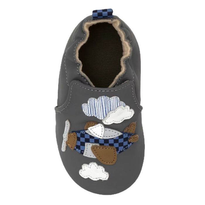 Gray baby shoe with soft solefeaturing airplane and clouds with checkered and striped fabric details.