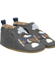 Pair of Gray baby shoes with soft soles featuring airplane and clouds with checkered and striped fabric details.