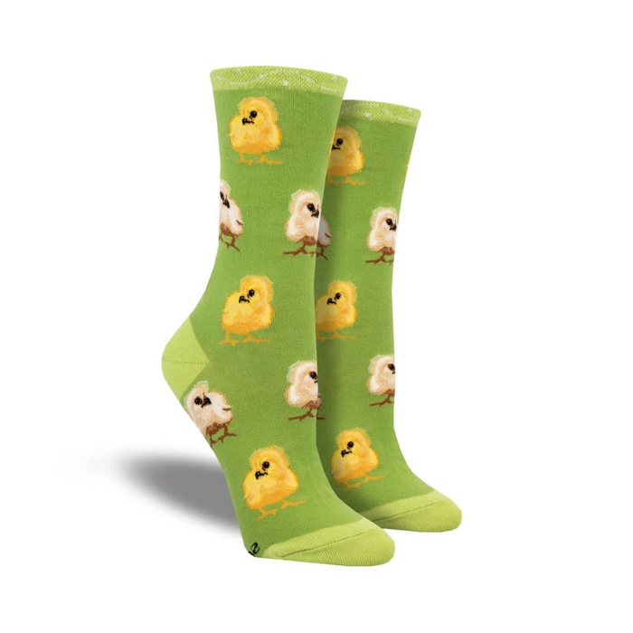 Green socks with baby little chickens on them.