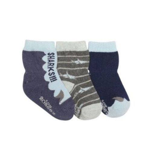 Three navy and grey shark themed socks