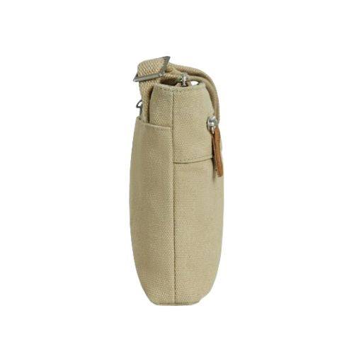 Side profile of the Heritage Anti-Theft Crossbody Bag in beige, showcasing its slim, compact shape ideal for travel and errands.
