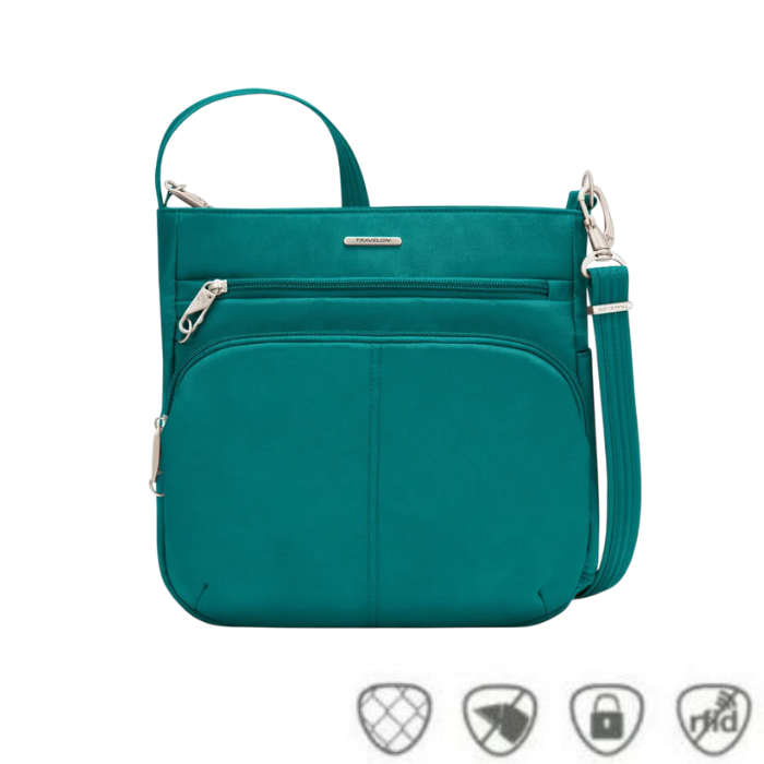Spruce-colored Travelon crossbody bag with multiple zippered compartments and an adjustable strap, shown with icons for anti-theft, cut-resistant, locking zippers, and RFID protection.