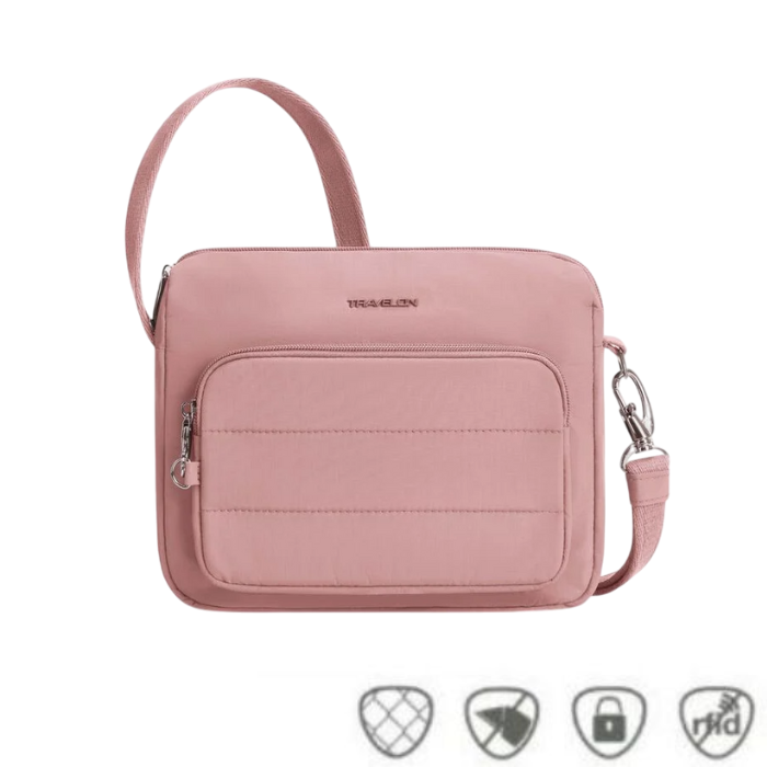 Travelon Anti-Theft Roam E/W Crossbody Bag in blush pink with front zip pocket and anti-theft icons, ideal for secure travel.