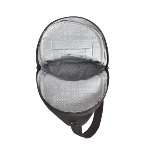 Interior of dark grey travel organizer sling bag with grey lining pockets for a passport and cards.