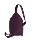 Back of plum sling bag with an adjustable strap.
