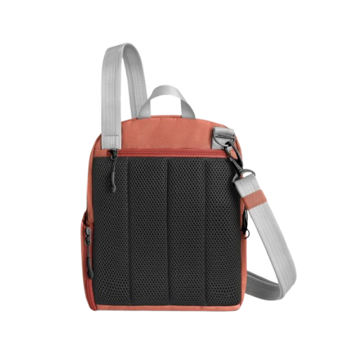 Terracotta orange bag back with black mesh lining and grey straps.