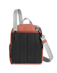 Terracotta orange bag back with black mesh lining and grey straps.