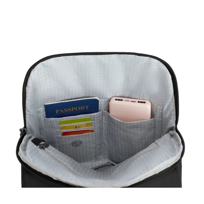 Open view of a black backpack with light grey interior pockets showing passport, cards, and a pink power bank.