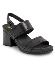Black sandal with a block heel, perforated designs, and buckle backstrap.