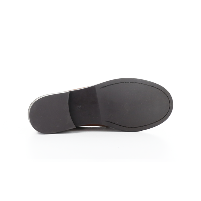 Black rubber outsole with small heel of a loafer.