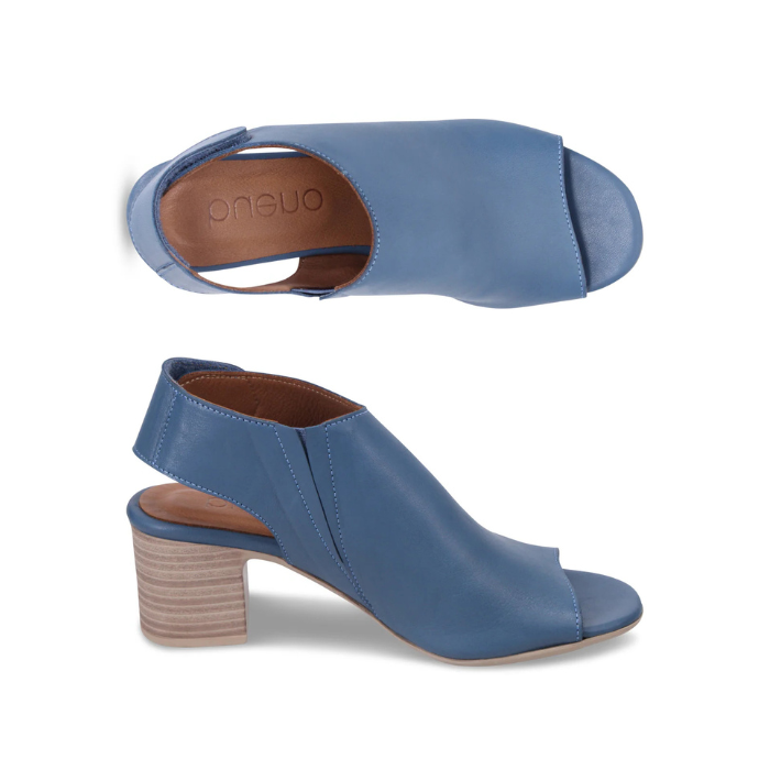 Pair of Blue peep-toe slingback sandals with  tan Bueno logo'd footbed and a brown block heel.