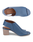 Pair of Blue peep-toe slingback sandals with  tan Bueno logo'd footbed and a brown block heel.