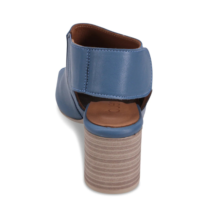 Blue slingback sandal with  tan footbed and a brown block heel.
