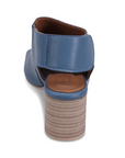 Blue slingback sandal with  tan footbed and a brown block heel.