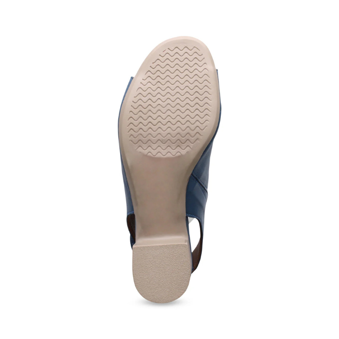 Tan wave pattern tread on block heel sandal's outsole.