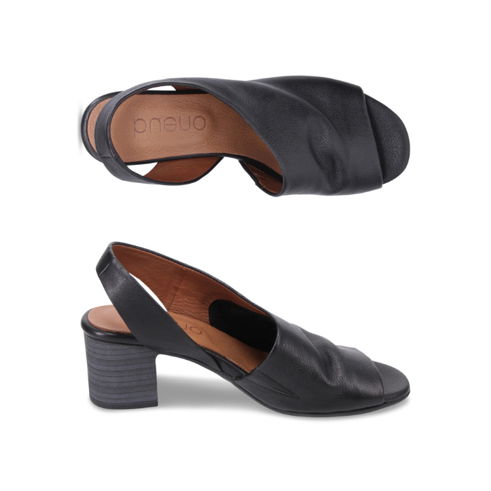 Pair of Black open-toe slingback sandals with tan Bueno logo'd footbed and stacked block heel.