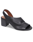 Black open-toe slingback sandal with tan footbed and stacked block heel.