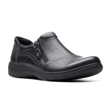 Black leather shoe with zipper closure, grey stitching and black rubber outsole.