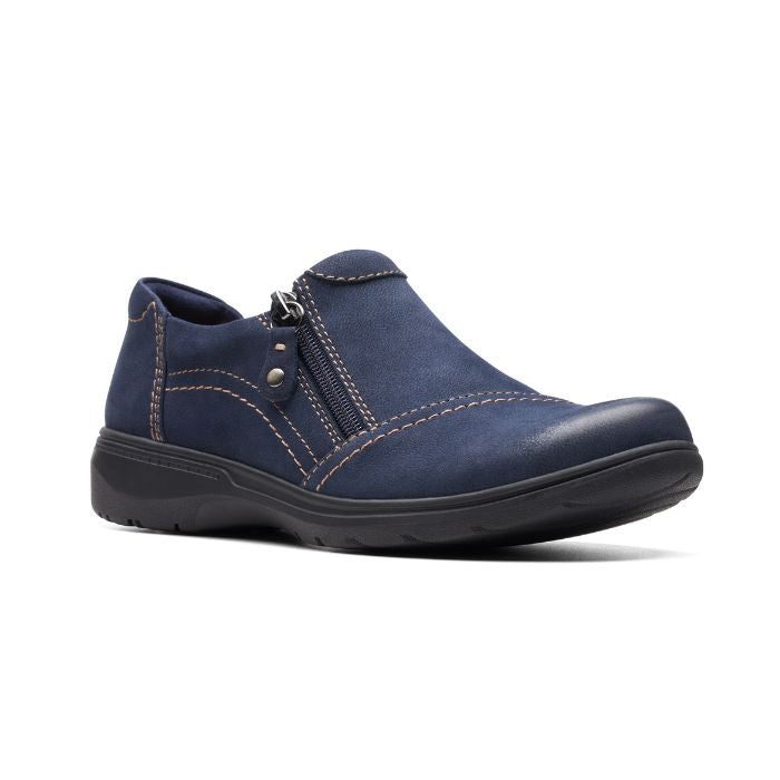 Navy nubuck shoe with zipper closure, beige top stitching and black rubber outsole.