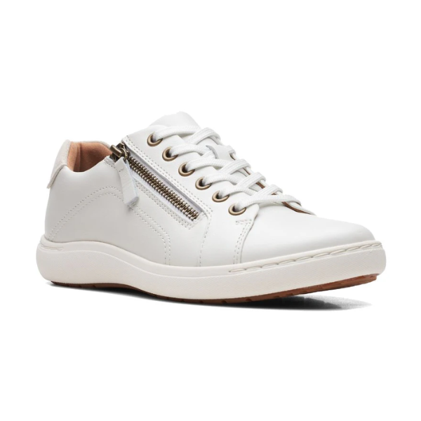 White sneaker with lace and side zipper closure.