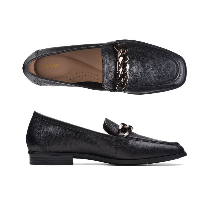 Black leather loafer with chain detailing and low stacked heel. Clarks logo on heel of brown insole.