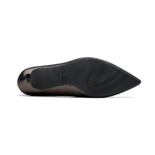 Black textured outsole with pump heel and Clarks logo stamped in middle.