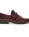 Woman's Oxford shoe in burgandy  leather with lace-up slip on style and a low stacked heel.