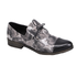 A women's lace-up oxford shoe with a black leather toe cap and a grey-white floral patterned upper and low stacked heel.