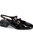 Women's Django & Juliette Viraz Slingback Heels in black patent leather with square toe, dual gold buckle straps, and low block heel.
