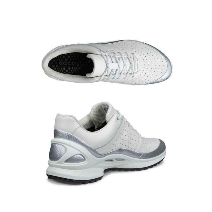 Pair of White athletic shoes with decorative perforations, silver accents, Ecco logo'd footbed and black outsole.