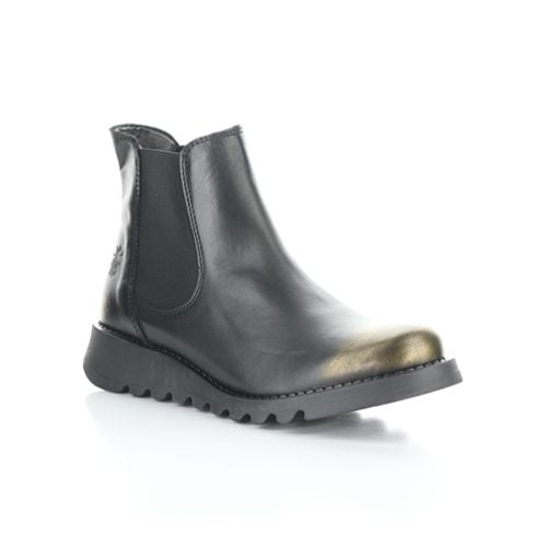 A black leather Chelsea boot with dual elastic side goring, bronze brushed toe cap, and a low lugged rubber outsole.