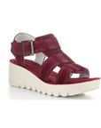 Deep Berry suede gladiator style sandal with detail stitching and a off-white lugged platform outsole.