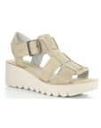 Taupe suede gladiator style sandal with detail stitching and a lugged platform outsole.