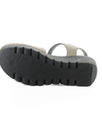 Black lugged wedge outsole with Fly London logo stamped on middle.